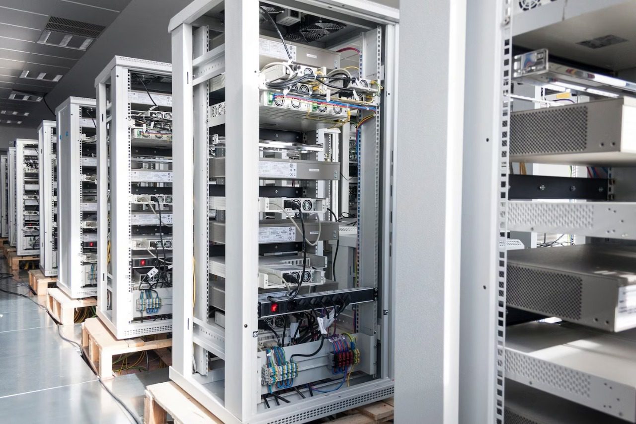 Modern data center server racks with network equipment and cabling for cloud infrastructure and enterprise IT systems