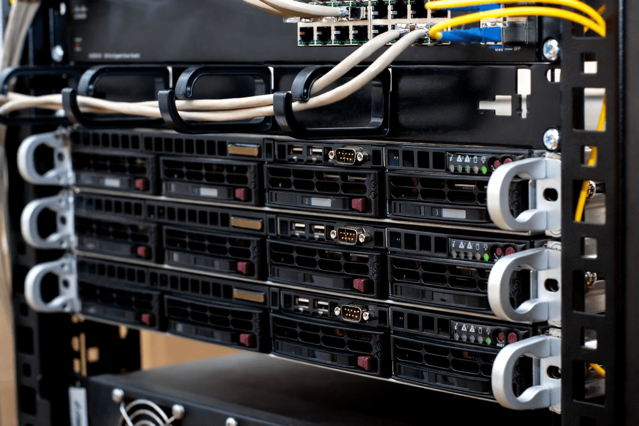 Rack-mounted enterprise servers with network cables in a data center for cloud computing and IT infrastructure
